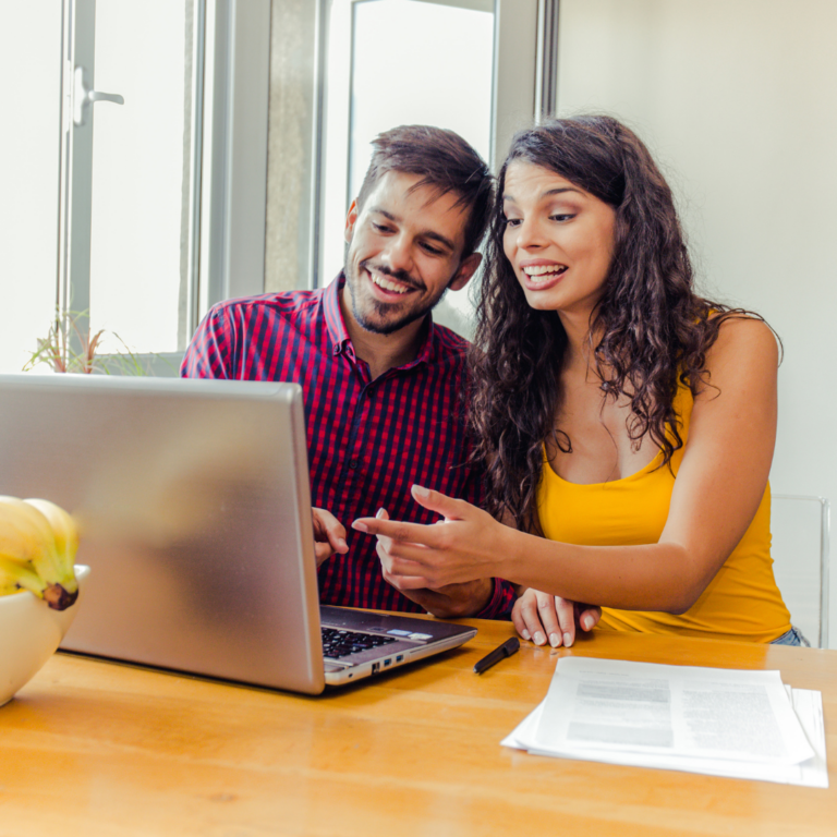 couple looking at laptop