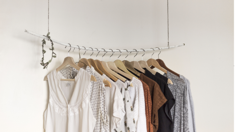 women's blouses on a clothing rack